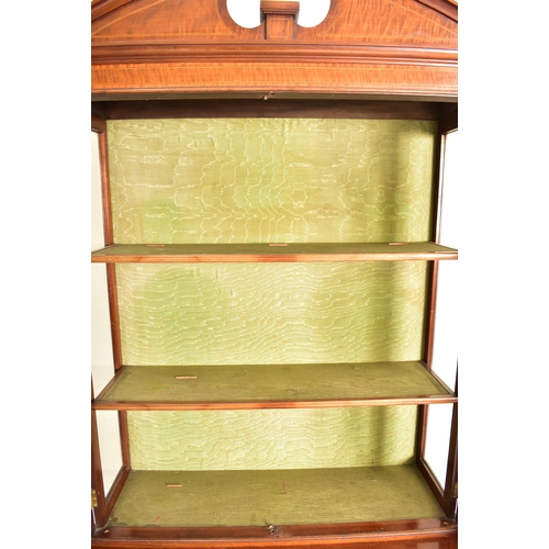 583 - An Edwardian mahogany china display bookcase cabinet vitrine on stand. The cabinet having an astraga... 