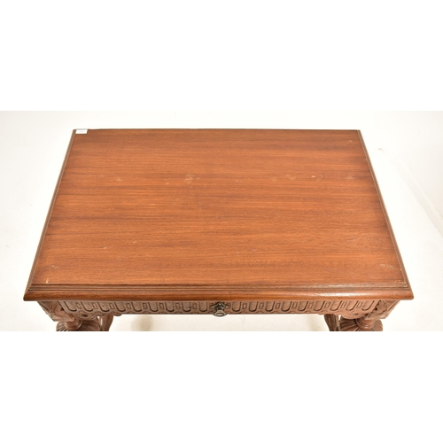 591 - A 19th century Continental Flemish / Dutch oak cup & cover writing table. The table having a chamfer... 