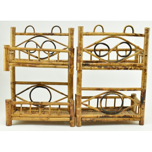 397 - A pair of late 19th century Victorian Aesthetic movement crafted bamboo hanging bookshelves. Each bo... 