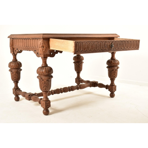 591 - A 19th century Continental Flemish / Dutch oak cup & cover writing table. The table having a chamfer... 