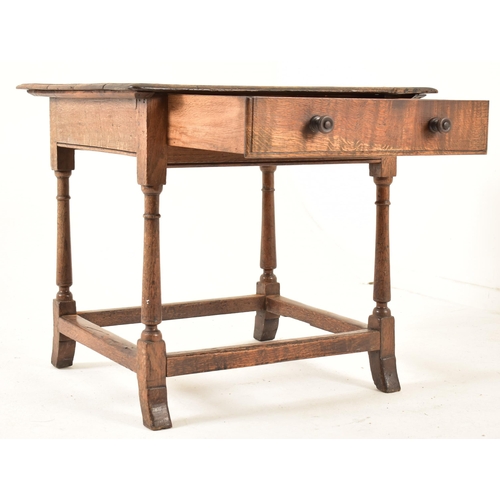 594 - A George III 18th century oak side low table. The table having a squared flared top over a twin hand... 