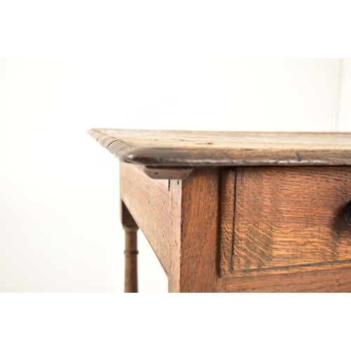 594 - A George III 18th century oak side low table. The table having a squared flared top over a twin hand... 