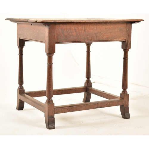 594 - A George III 18th century oak side low table. The table having a squared flared top over a twin hand... 