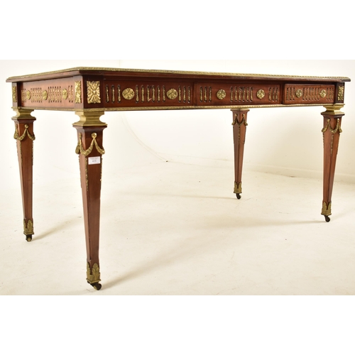 405 - Howard & Sons - A Victorian 19th century mahogany & ormolu rectangular writing desk. The desk having... 