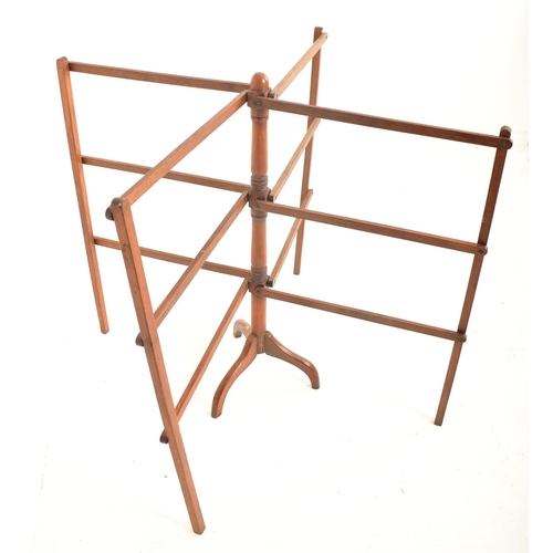 599 - A Victorian 19th century floor standing expanding clothes line stand. Mahogany tripod leg base with ... 