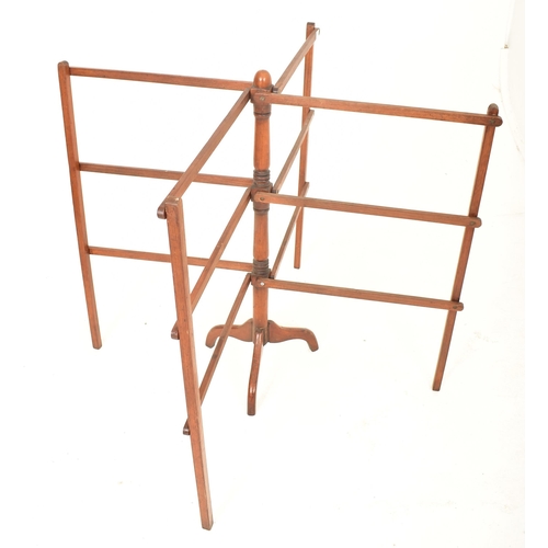 599 - A Victorian 19th century floor standing expanding clothes line stand. Mahogany tripod leg base with ... 