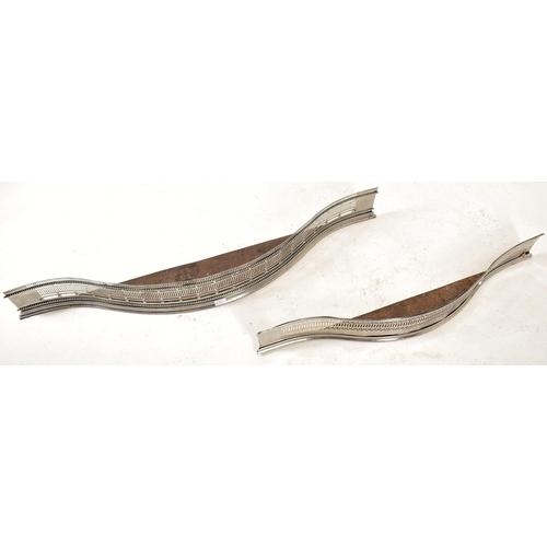 600 - Two graduating George III early 19th century polished steel fire fenders / Kerbs. Each fender kerb h... 