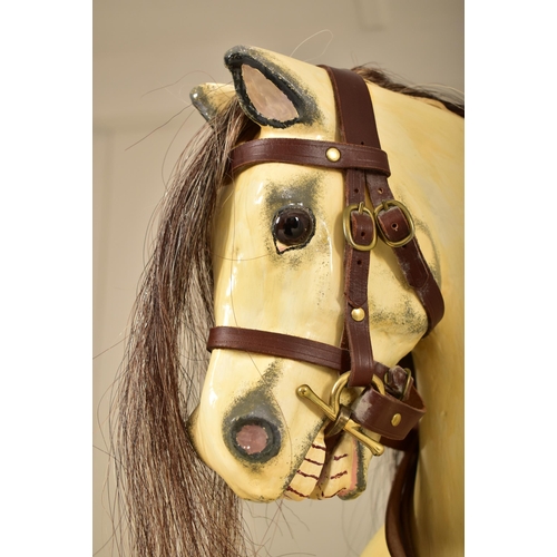 601 - G & J Lines Brothers - A vintage early 20th century rocking horse. The horse with hand painted finis... 