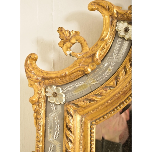 605 - A large Italian Venetian 19th century gilt gesso & wood wall hanging mirror. The mirror having an in... 