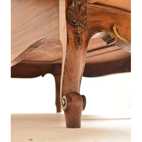 416 - A continental early 20th century walnut crossbanded twin pedestal kidney shaped desk. The desk havin... 