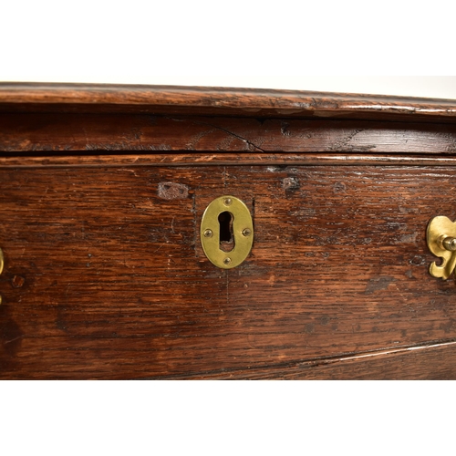 427 - A George III 18th century oak lowboy desk. The desk having single drawer to the frieze and with flar... 