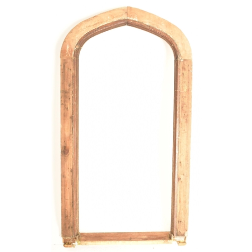 441 - A Victorian 19th century carved wood window frame. The frame in Gothic style with stepped frame. Rai... 