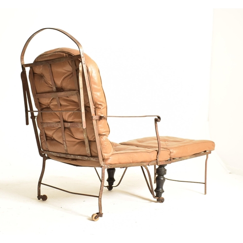 453 - A Victorian 19th century metal folding campaign chair / armchair. The chair made of three folding se... 