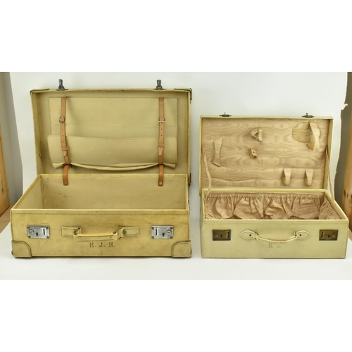 459 - A pair of 20th century pig skin leather travelling suitcases. Each suitcase of rectangular form with... 