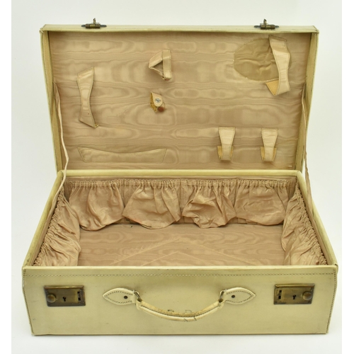 459 - A pair of 20th century pig skin leather travelling suitcases. Each suitcase of rectangular form with... 