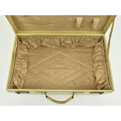 459 - A pair of 20th century pig skin leather travelling suitcases. Each suitcase of rectangular form with... 