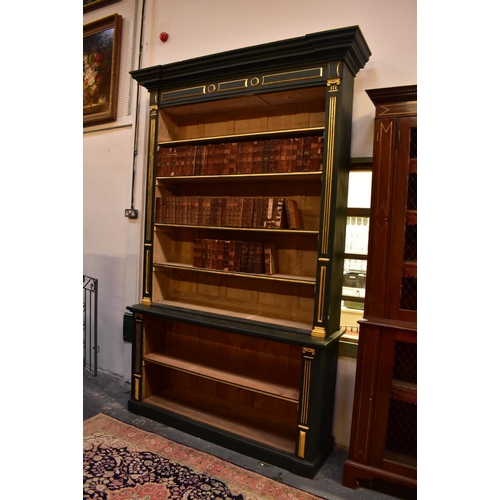 461 - A George III 19th century painted oak & pine wood open library bookcase. The bookcase having a pedim... 