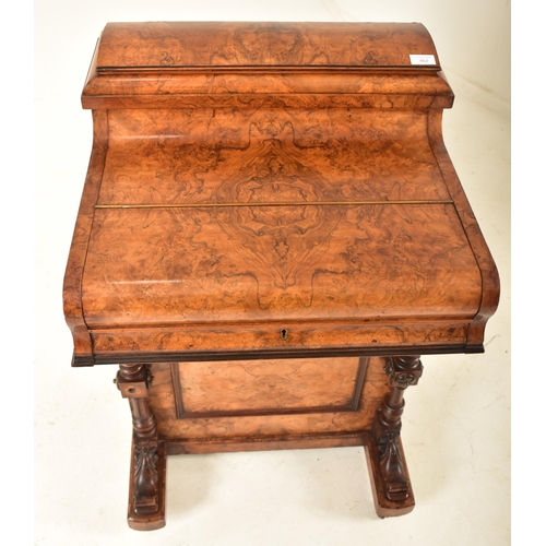 462 - A Victorian 19th century figured walnut veneered piano top Davenport writing desk. The desk having a... 