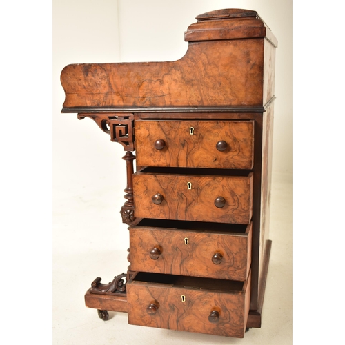 462 - A Victorian 19th century figured walnut veneered piano top Davenport writing desk. The desk having a... 