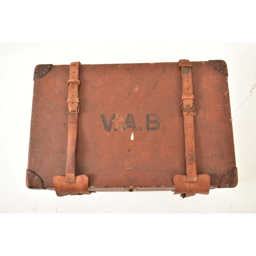 467 - Harrods, London - An early 20th century Pukka Luggage leather strapped & canvas travel suitcase lugg... 