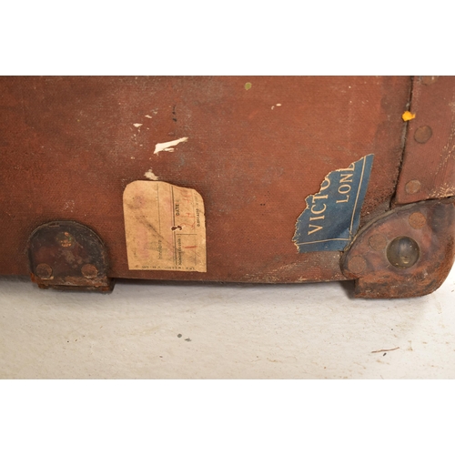 467 - Harrods, London - An early 20th century Pukka Luggage leather strapped & canvas travel suitcase lugg... 