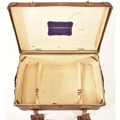 467 - Harrods, London - An early 20th century Pukka Luggage leather strapped & canvas travel suitcase lugg... 