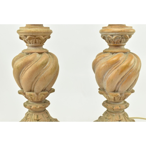 472 - A pair of Classical inspired resin wooden effect desk table lamps. Each lamp having a reeded turned ... 