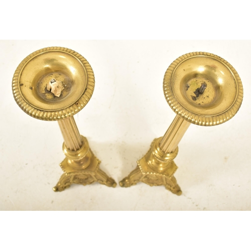 478 - A pair of 19th century Victorian brass floor standing prickets, likely ecclesiastical in nature. Eac... 