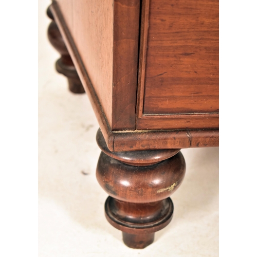 486 - A 19th century mahogany bow fronted chest of drawers. The chest having a chamfered edge top over two... 