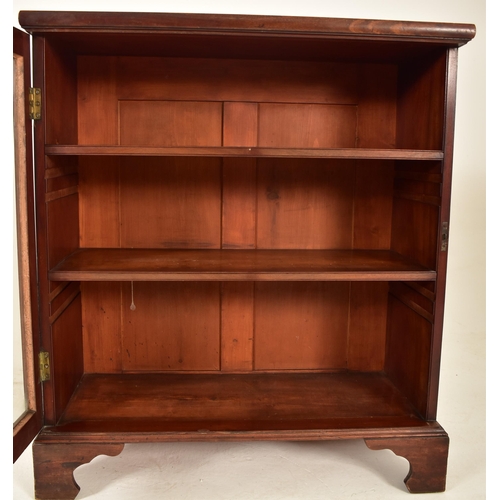 490 - A George III early 19th century mahogany glazed floor-standing bookcase cabinet. The cabinet having ... 