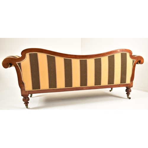 492 - A William IV 19th century double scroll end Chesterfield sofa. The sofa having a curved shaped back ... 