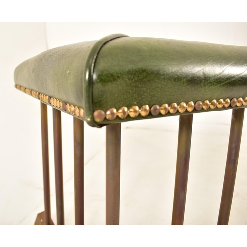 494 - A Victorian style copper, brass & leatherette club fire fender. The fender having corner padded leat... 