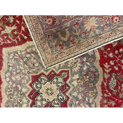 463 - A late 19th century Turkish Islamic Kayseri hand woven floor carpet rug. The rug having a a central ... 