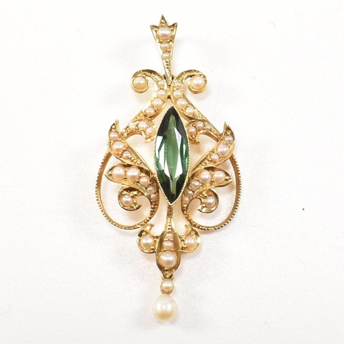 12 - An Edwardian 15ct gold, tourmaline and pearl pendant. The pendant having a central bezel set marquis... 