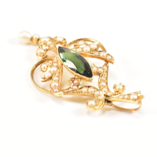 12 - An Edwardian 15ct gold, tourmaline and pearl pendant. The pendant having a central bezel set marquis... 