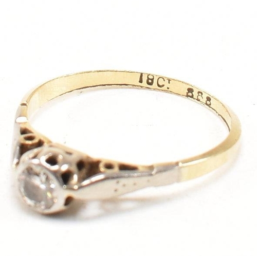 155 - An 18ct gold and diamond solitaire ring. The single stone engagement style ring having a bezel set r... 