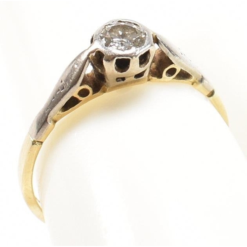 155 - An 18ct gold and diamond solitaire ring. The single stone engagement style ring having a bezel set r... 