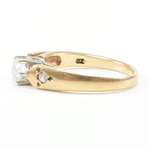 182 - A hallmarked 9ct yellow gold and cubic zirconia engagement style ring. The ring having a round cut w... 