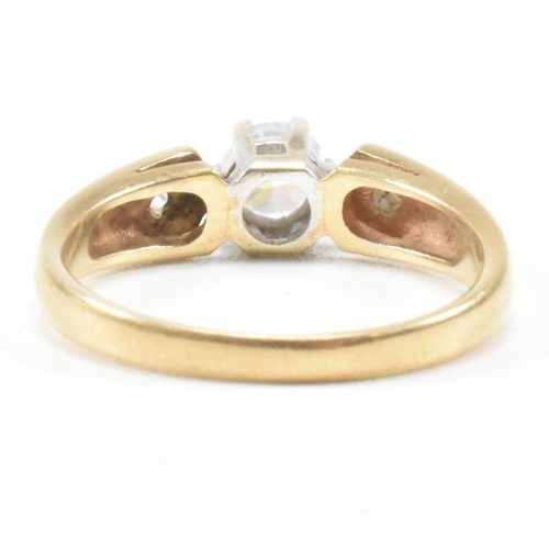 182 - A hallmarked 9ct yellow gold and cubic zirconia engagement style ring. The ring having a round cut w... 