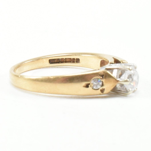 182 - A hallmarked 9ct yellow gold and cubic zirconia engagement style ring. The ring having a round cut w... 