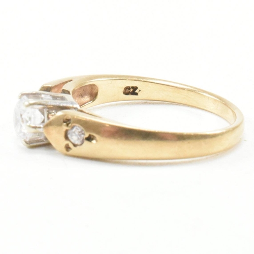 182 - A hallmarked 9ct yellow gold and cubic zirconia engagement style ring. The ring having a round cut w... 