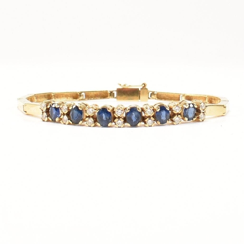 19 - 18ct gold sapphire & diamond bracelet. The braceleted formed with rectangular box links set with 6 o... 