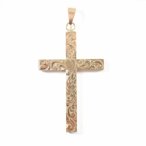 257 - A vintage hallmarked 9ct yellow gold necklace pendant. The pendant in the form of a cross having rep... 
