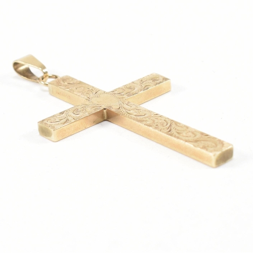 257 - A vintage hallmarked 9ct yellow gold necklace pendant. The pendant in the form of a cross having rep... 