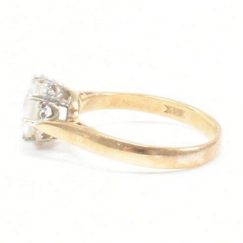 259 - A vintage hallmarked 9ct yellow gold and CZ solitaire ring. The single stone engagement style ring h... 