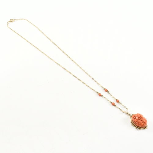 40 - A hallmarked 9ct gold, carved precious coral and pearl pendant necklace. The necklace having preciou... 