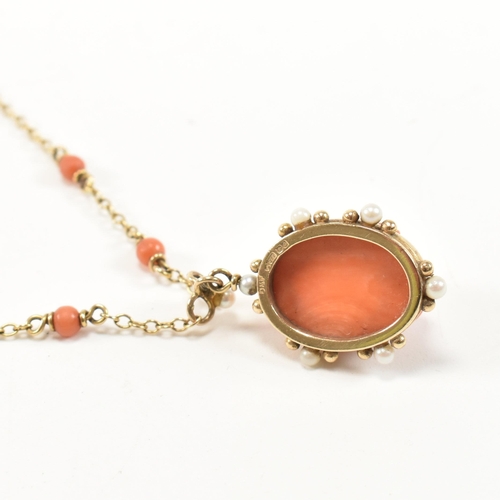 40 - A hallmarked 9ct gold, carved precious coral and pearl pendant necklace. The necklace having preciou... 