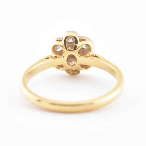 41 - A hallmarked 18ct gold and diamond cluster ring. The ring set with 7 diamonds, estimated diamond wei... 