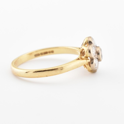 41 - A hallmarked 18ct gold and diamond cluster ring. The ring set with 7 diamonds, estimated diamond wei... 