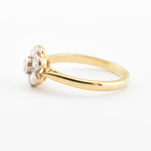 41 - A hallmarked 18ct gold and diamond cluster ring. The ring set with 7 diamonds, estimated diamond wei... 